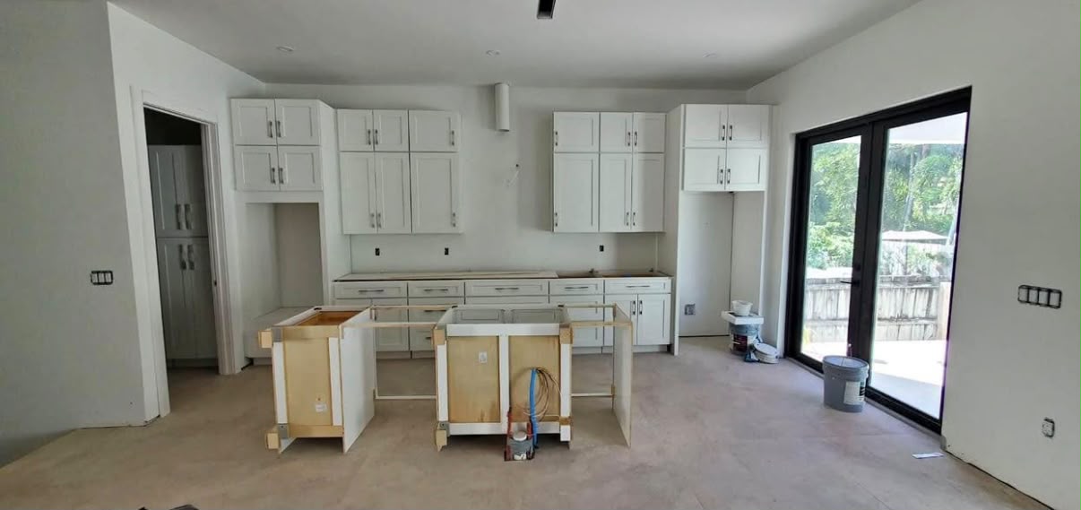 Installed white kitchen cabinets